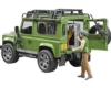 Fotografija izdelka Igrača Džip Land Rover z  gozdarjem in psom, BRUDER