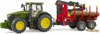 Fotografija izdelka Igrača traktor John Deere  7R 350 s prikolico in hlodi, Bruder
